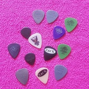 13 guitar picks from local bands in Ohio